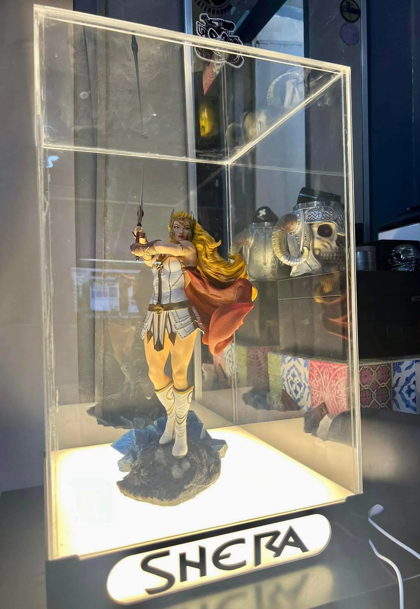 Private collector lit glass cabinet setup